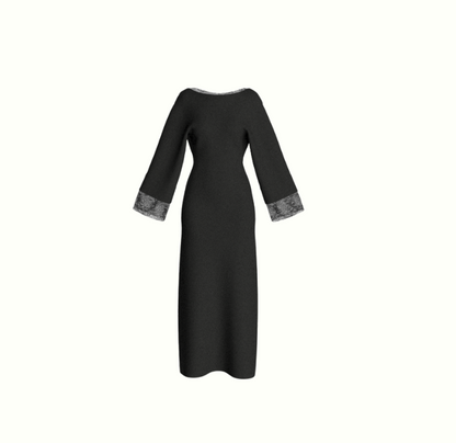 A black dress with three-quarter sleeves and contrasting black lace cuffs, shown against a plain white background.